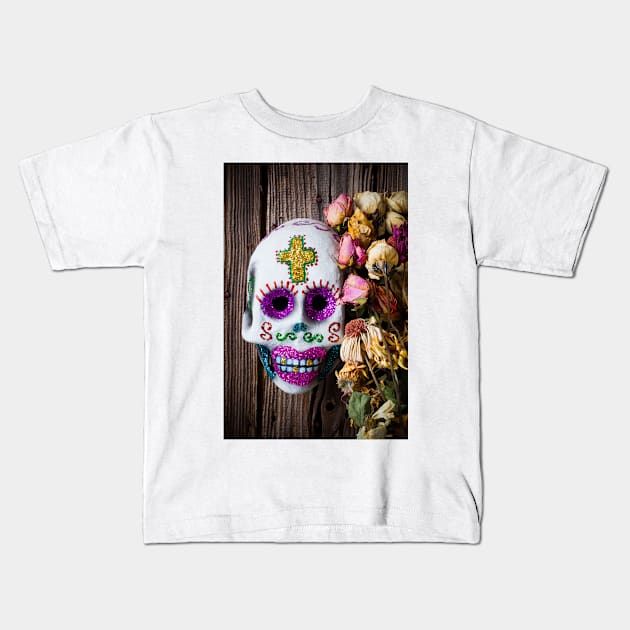 Fancy skull and dead flowers Kids T-Shirt by photogarry